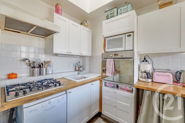 Appartement F4 à vendre - 4 pièces - 72.77 m2 - PARIS - 75018 - ILE-DE-FRANCE - Century 21 Patrimoine 17